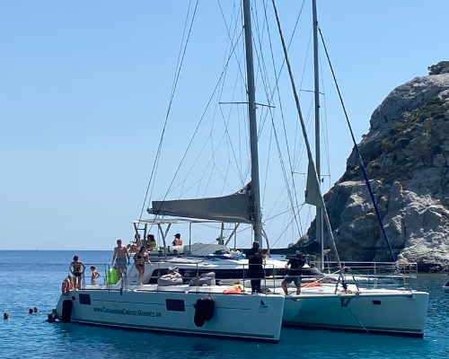 Explore the East Coast Beaches with Sailing Catamaran Wind | Cruises | Captains Tours Rhodes Greece